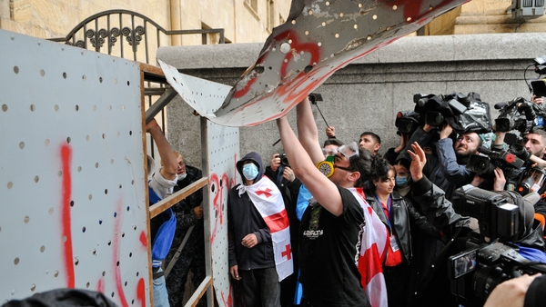 Around 2,000 mainly young protesters gathered outside the Georgian parliament ahead of the vote