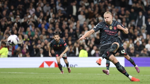 Erling Haaland scores from the penalty spot to make it 2-0 to Manchester City at Tottenham Hotspur Stadium