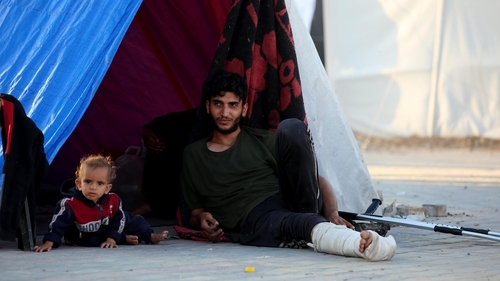 Palestinians are seen living in the tents at Nuseirat Refugee Camp