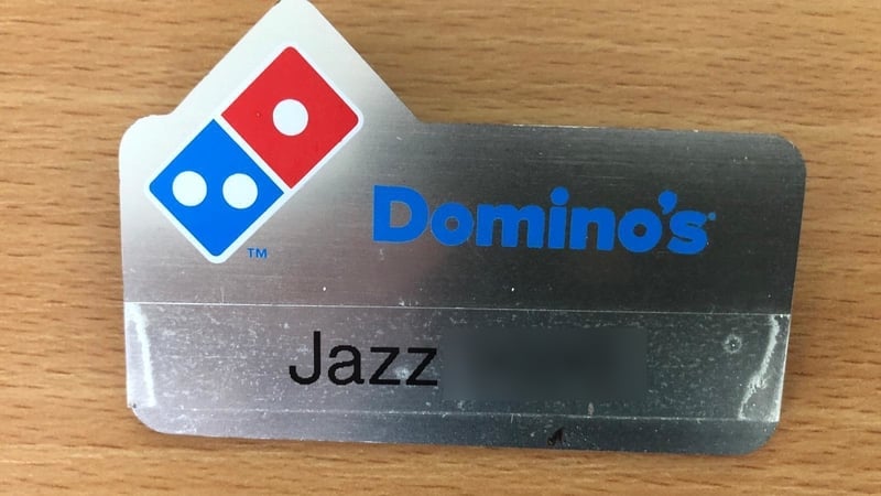 A name badge exhibited to the WRC in February by lawyers acting for Jasmine Olaru in her sexual harassment complaint against Domino's Pizza franchisee Remo Foods - Image has been blurred