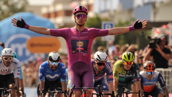 Jonathan Milan celebrates his stage win