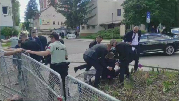 Security personnel responded to the gun attack on Robert Fico