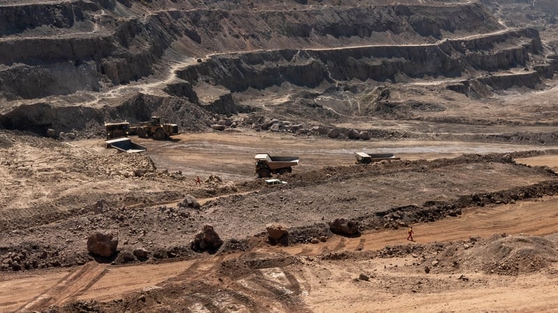 Trucks haul away ore from a pit in Tenke Fungurume Mine in the Democratic Republic of Congo, one of the largest copper and cobalt mines in the world