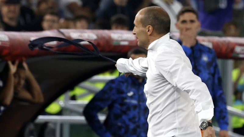 Massimiliano Allegri throws away his tie after receiving a red card against Atalanta