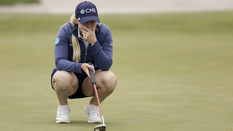 Stephanie Meadow lines up a putt on the 12th green at Liberty National Golf Club