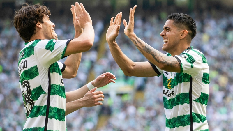 Palma (R) netted late on to wrap up Celtic's title in style
