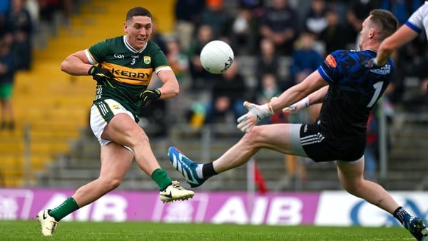 Joe O'Connor of Kerry has a shot saved by Monaghan goalkeeper Rory Beggan