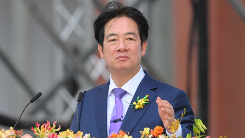 Taiwan President Lai Ching-te addressing the crowd outside the Japanese-colonial-era presidential office in central Taipei