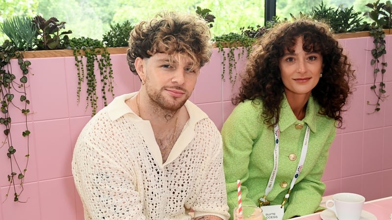 Tom Grennan and Danniella Carraturo attend the evian VIP Suite at Wimbledon in June 2022 in London. (Photo by David M. Benett/Dave Benett/Getty Images for evian)