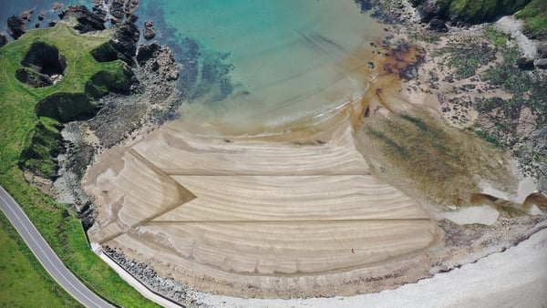 The Palestinian flag drawn in the sand at Kilmurrin Cove, Co Waterford (Courtesy: Sean Corcoran)
