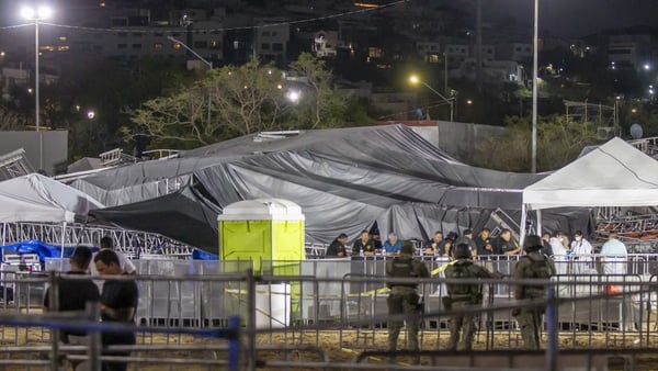 The debris is seen covered with a tarp after a stage collapsed during a campaign rally for Mexican presidential candidate Jorge Alvarez Maynez