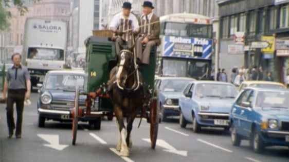 Horse-drawn bread van on O'Connell Street in Dublin, 1974.
