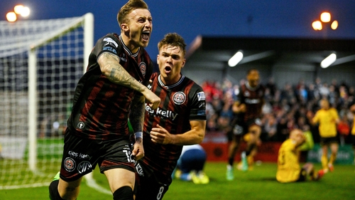 Danny Grant of Bohemians, left, celebrates