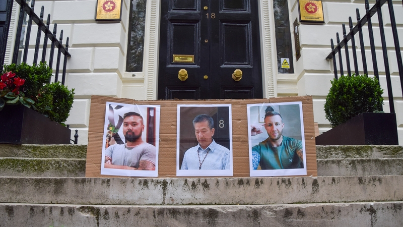 Pictures of Chi Leung Wai, Chung Biu Yuen, and Matthew Trickett during a protest outside the Hong Kong Economic and Trade Office (HKETO) in London