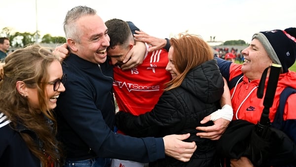 Louth's Ciaran Downey celebrates victory with his family