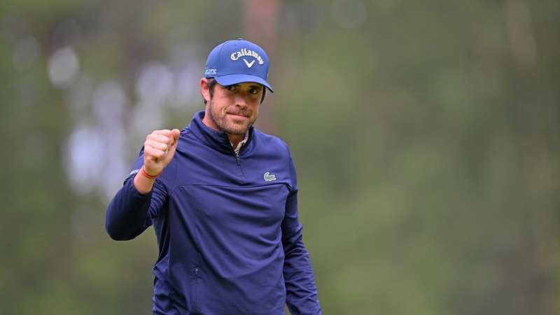 Nacho Elvira celebrates a successful putt on the 17th hole