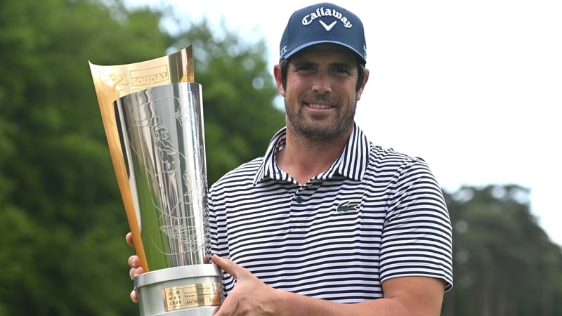 Nacho Elvira with the trophy after winning by one shot