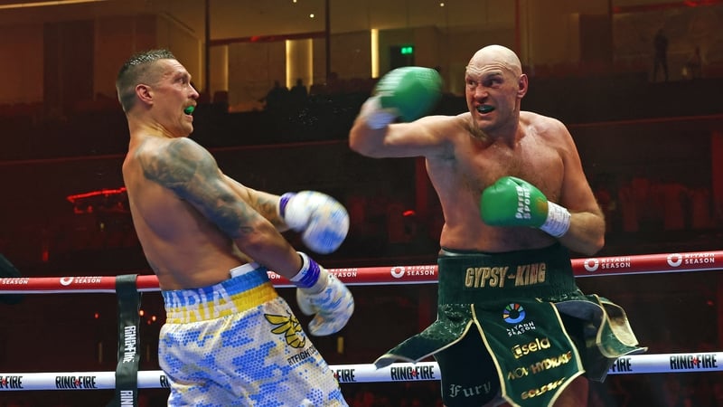 Usyk (L) dealt Fury his first professional defeat