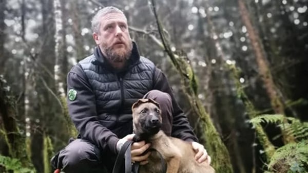 Rory Hennebry, and AK, the subjects of Canine