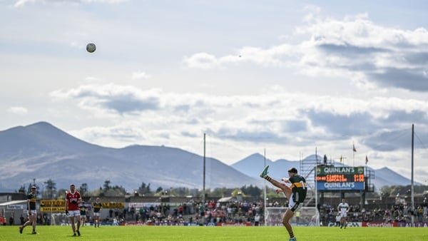 Seán O'Shea of Kerry kicking a point from distance against Cork in the this year's Munster semi-final