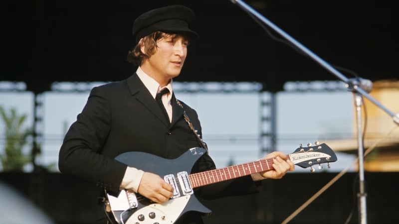 John Lennon guitar breaks record at auction
