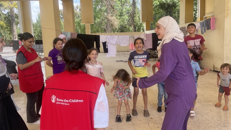 Twelve-year-old Aya (right) said she is not happy in the shelter and that she wants to play with her own toys, in her own home