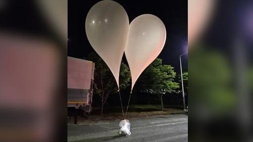 Hundreds of balloons carrying rubbish have been launched by North Korea