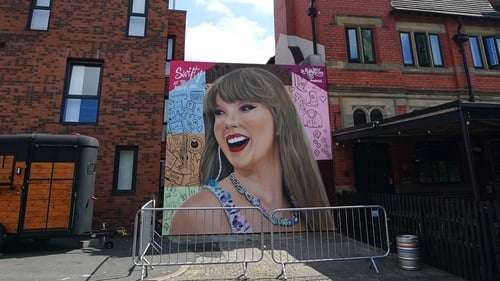 A a mural of Taylor Swift on Phoenix Hotel in Liverpool ahead of special artworks being installed in celebration of Taylor Swift's Eras Tour arriving in the city