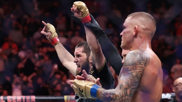 Islam Makhachev celebrates after defeating Dustin Poirier