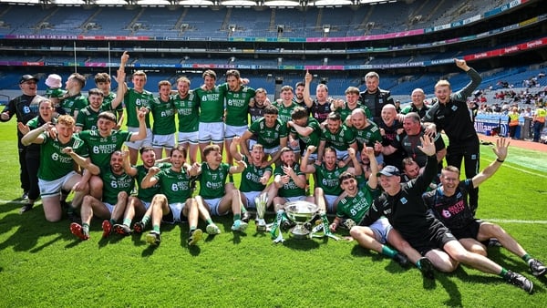 Fermanagh players and backroom team celebrate with Lory Meagher Cup