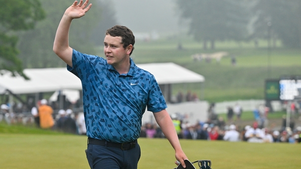 Bob MacIntyre reacts after winning on the 18th green
