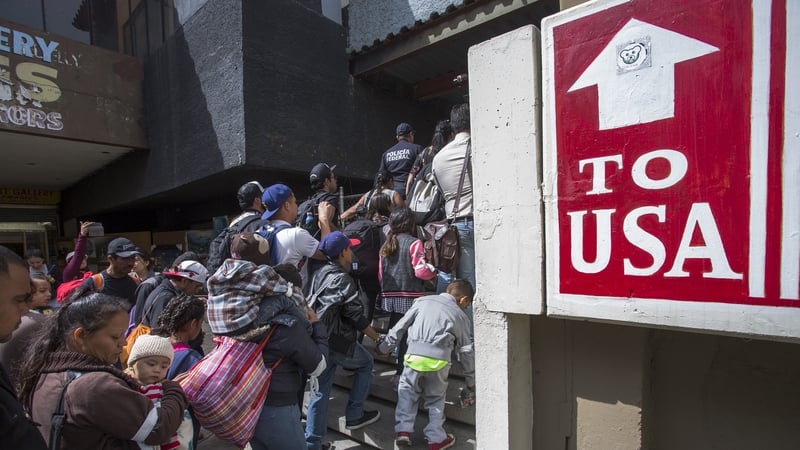 Over 300 members of a caravan of Central Americans who spent weeks traveling across Mexico ask US authorities for asylum in April 2018 in Tijuana, Baja California Norte, Mexico. Photo: David McNew/Getty Images