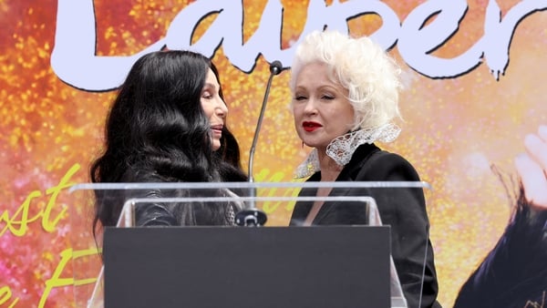 Cher and Cyndi Lauper speak onstage during the Cyndi Lauper Hand and Footprint in Cement Ceremony at TCL Chinese Theatre Hollywoodat TCL Chinese Theatre in Hollywood, California. (Photo by Amy Sussman/Getty Images)
