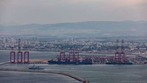 Commercial ships and an Israeli naval vessel are seen in the port city of Haifa (File image)