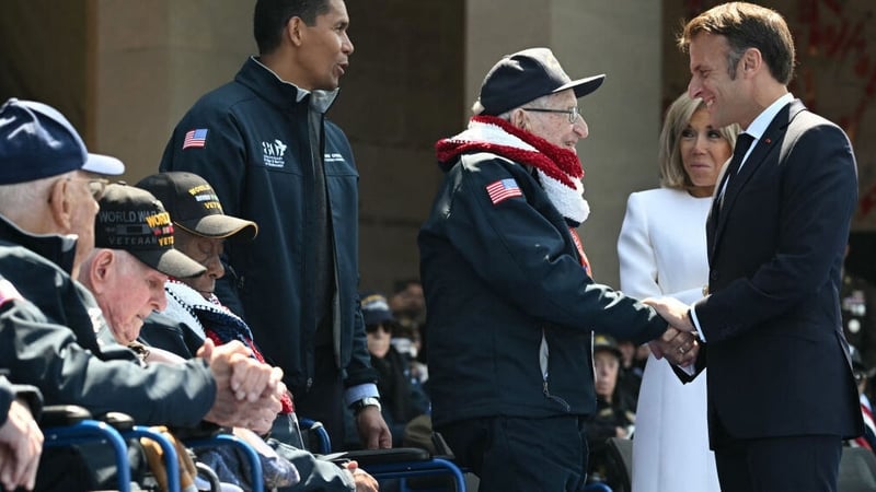 Edward 'Bud' Berthold, aged 104, is honoured by French President Emmanuel Macron