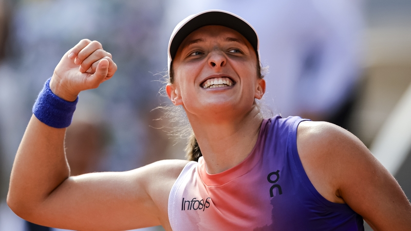 Iga Swiatek celebrates after winning her semi-final against Coco Gauff