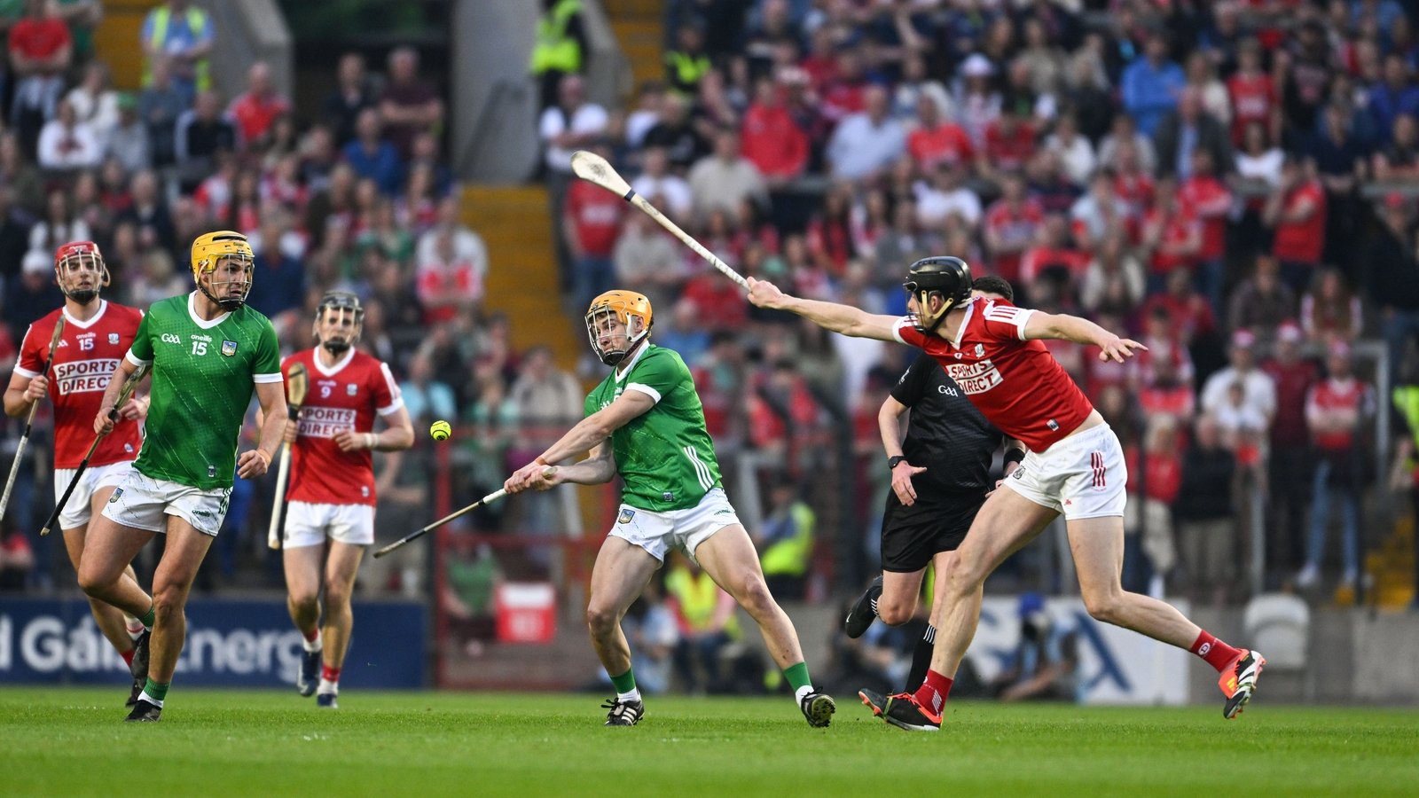 Adam English takes a shot under pressure from Cork's Robert Downey of Cork