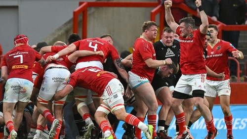 Peter O'Mahony (r) celebrates winning a scrum penalty