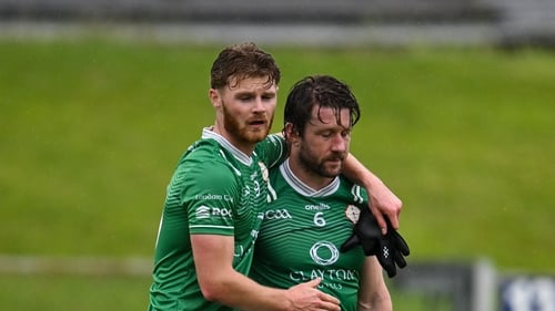 Tighe Barry, left, and Cahir Healy despondent at the end of the game