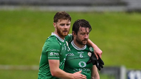 Tighe Barry, left, and Cahir Healy despondent at the end of the game