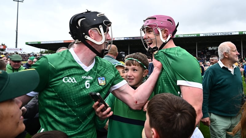 Limerick players Declan Hannon, left, and Shane O'Brien celebrate after the final whistle