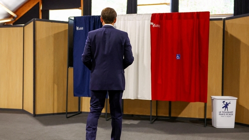 Emmanuel Macron voting earlier today