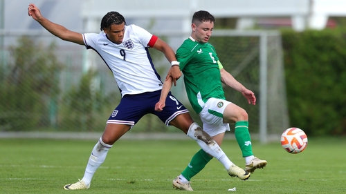 Ireland captain Joe Hodge battles with Dane Scarlett
