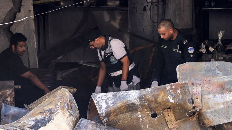 The Kuwaiti fire department said the victims suffocated from rising smoke after the fire broke out at the base of the building