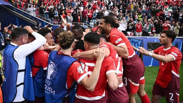 Breel Embolo is mobbed after his goal