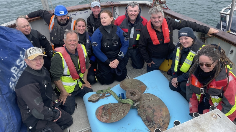 The dive team and support on MV Harpy after recovering the propeller