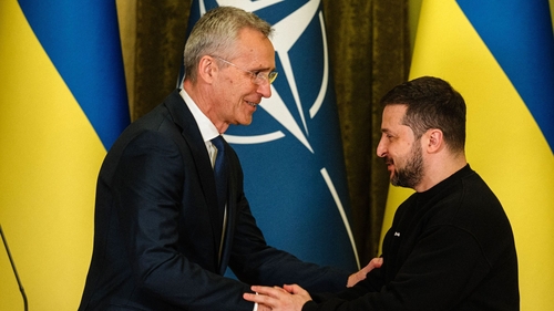 NATO chief Jens Stoltenberg pictured shaking hands with Ukrainian President Volodymyr Zelensky last year