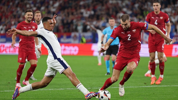 Trent Alexander-Arnold (L) lined out in the unfamiliar position of centre midfield against Serbia