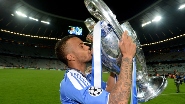 Ryan Bertrand kisses the Champions League trophy after Chelsea's victory over Bayern Munich in 2012