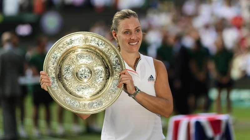Angelique Kerber poses for photos with the Venus Rosewater Dish after her Wimbledon success in 2018
